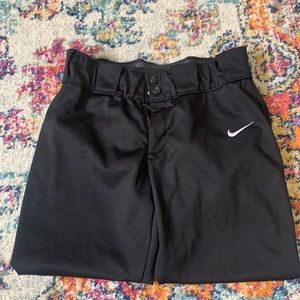 Women’s Nike softball pants, knee length.